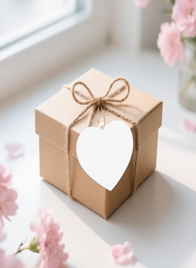 g2 بلس مجموعة G2PLUS من 100 قطعة من بطاقات الهدايا البيضاء على شكل قلب، بطاقات هدايا على شكل قلب، مقاس 2.5 × 2.2 بوصة، بطاقات ورقية فارغة للتعليق مع خيط، مناسبة لعيد الحب، وحفلات الزفاف، وتوزيعات حفلات الكريسماس. - Image 4